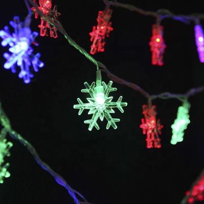 China Snowflake String Lights Custom Shell Warm White Led Tree String Light Christmas Plastic Decoration for sale