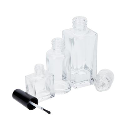 China 15ml 20ml 30ml Cosmetic Luxury Square Clear Empty Glass Bottle For Nail Care Nail Polish Bottle With Black Screw Lid And Brush for sale