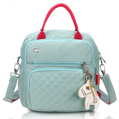 China USA Large Capacity Water Resistant Mom Diaper Bag Backpack Designer Diaper Bags For Baby for sale