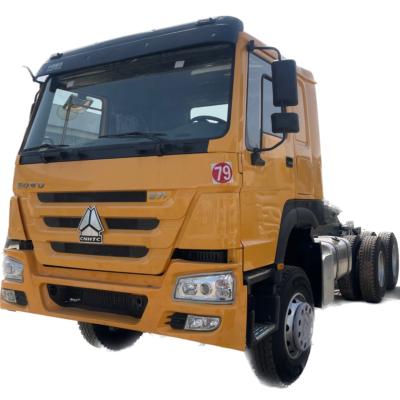 China Caminhão amarelo usado SINO Caminhão de 10 rodas RHD 30tons 6x4 HOWO Caminhão de descarga 375 Caminhão à venda