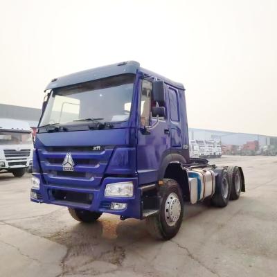 China Goedkope tweedehands HOWO 6X4 375HP tractor truck hoofd met comfortabele cabine in Afrika Te koop