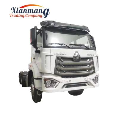 China Gebraucht 6*4 10 Wheeler 400 PS Howo NX Pferdetraktoren mit manuellem Fenster WEICHAI Motor zu verkaufen