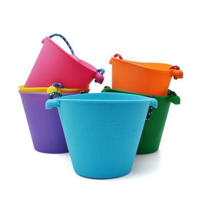 China Eco-Friendly Sand Buckets HECION Childcare Eco Friendly Silicone Material Foldable Easy Clean Funny Beach Toys Sand Filled Sand Buckets for sale