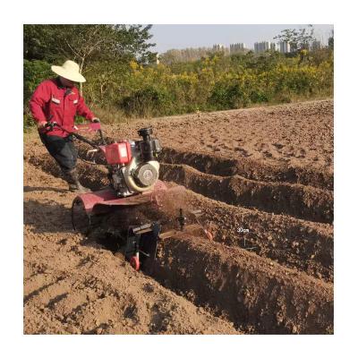 China Transmissão de todas as engrenagens Tração nas quatro rodas Tipo de potência de gasolina Cultivador de ervas daninhas à venda