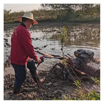 China 85 KG Novo projeto compacto de tração nas quatro rodas com transmissão de todas as engrenagens Mini Power Tiller Cultivator à venda