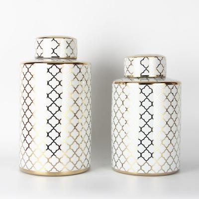 China Transitional Luxury Ceramic Decorative White And Gold Storage Canister Jars With White Lids Porcelain Bottles for sale