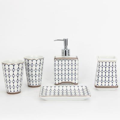 China Sustainable Ceramic Bathroom Storage Set Toilet Reading Brush White Color Gold Line Bathing Room Set for sale