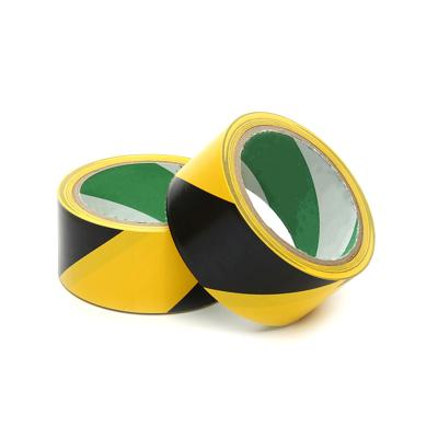 China Price Waterproof Black Yellow Striped PVC Risk Voucher Flooring Line Marking Tape for sale