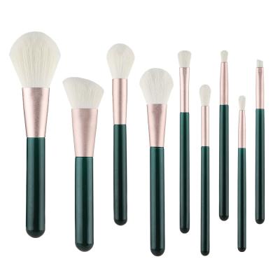 China Angular Blush 2021New 9 Pieces Makeup Brush Set, Christmas Green Wooden Handle Synthetic Fiber Brush Cosmetic Kit for sale