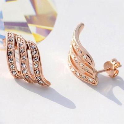 China Hot Sale FASHIONABLE White Gold Plating Diamond Stud Earring Female Lovely Angel Wing Silver Stud Earring for sale