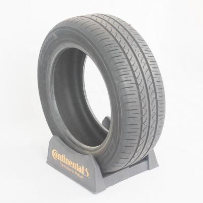 China Eco-friendly Plastic Simple Car Tire Tire Rack Display Stand for sale