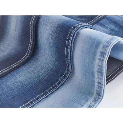 China Breathable irregular PX802 twill cotton spandex broken jeans fabric for new design jackets for sale