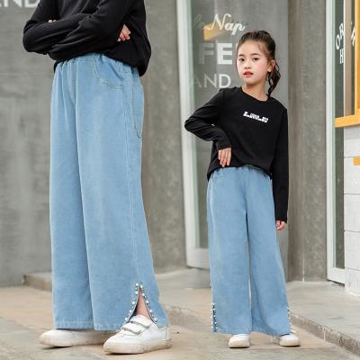 China 2022 Autumn Girls New Style Fashion Casual Open Fork Pearl Side Spring Wide Leg Pants Kids Trousers Jeans for sale