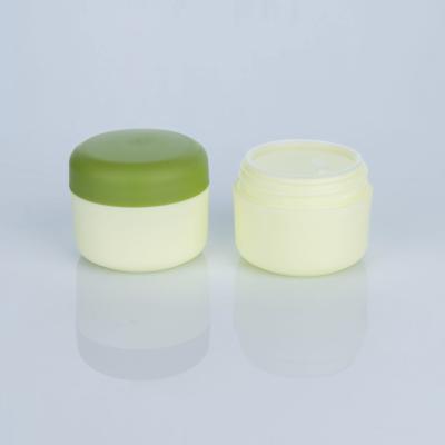 China 35ml Cosmetic Green Cosmetic Plastic Jars With Lids Empty PET Cosmetic Jar Jar Printing Luxury Cosmetic Jars for sale