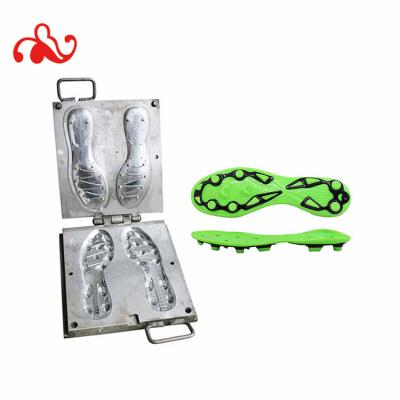 China Yongxin Professional Sole Mold Maker TPU Football Soles Mold Sole TPU Football Outsole Injection Molding for sale