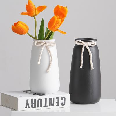 China Northern European simple white ceramic flowers decoration flower vase dry living room table household decoration and modern for sale