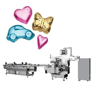 China Full Automatic Food Heart Shape Foil Wrapping Machine For Chocolate for sale