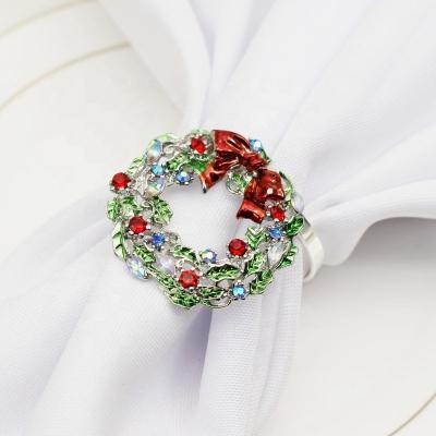 China Newest Viable Christmas Silver Color Bow Flower Garland Napkin Ring Hotel Sample Room Table Christmas Napkin Loop HWC16 for sale