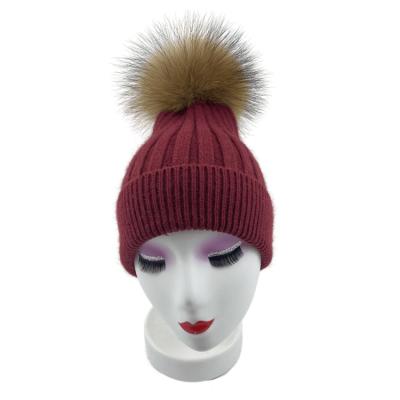 China breathable & Wholesale New Winter Hat Thick Wool Waterproof Hat Knit Hat With Velvet Rib Skullcap For Ladies Genuine Fur Ball Hat 2021 for sale