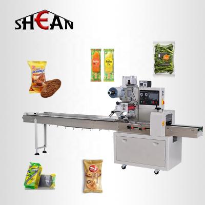 China Full Automatic Vegetable Food Pillow Packaging Machine Auger Filler Machine Snacks Packing Machine for sale