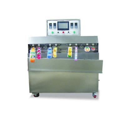 China 8 Heads And 4 Groups 2 Station 8 Efficient Semi Automatic Head Inflatable Bag Filling Sealing Machine For Wholesales for sale