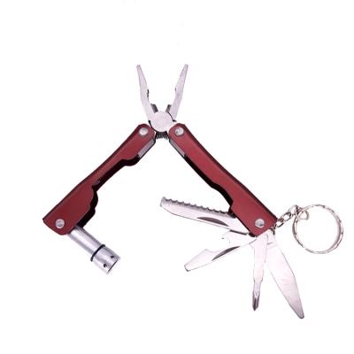 China Outdoor Portable Multifunctional Easy Carry Folding Pliers Tool Kit LED Light Wire Cutter Screwdriver Keychain Saw Bottle Opener Knife Camp for sale