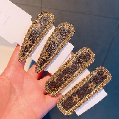 China New Retro Rhinestone INS Autumn And Winter Letter Leather Hairpin Fashion Hairpin Girl Fashion Women's Hair Claw Smart Casual Broken Hair Claw for sale