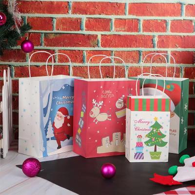 China Recycled materials Christmas gift themed paper bags with handle shopping bags are customizable in colors and your own logo for sale