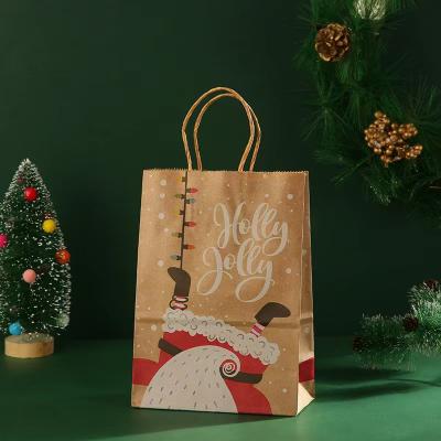 China Recycled Christmas Packaging Materials Shopping Paper Bags Custom Gift Paper Bags With Your Own Logo On The Handle for sale