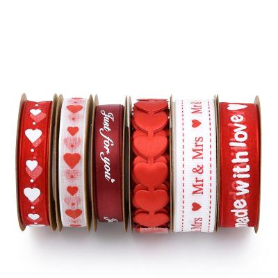 China Luster Love Embossed Ribbon for Wedding Decoration Lover Gift Wrapping Peach Heart Red Lace Band for sale