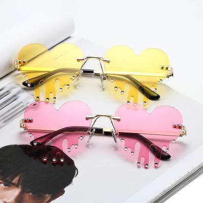 China Durable Funny Glasses Love Seller Halloween Party Sun Broken Heart Glass Broken Heart Hot Drip Rips Rimless Sunglasses for sale