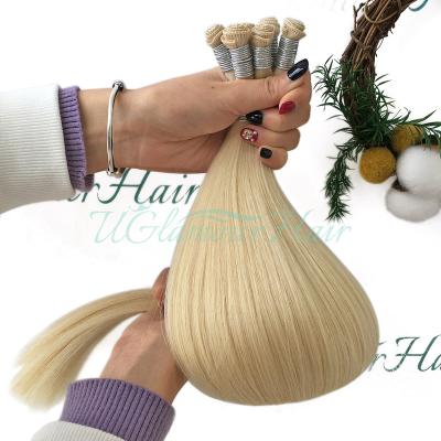 China Natural Appearance Unprocessed top rated 100% European Virgin full shine Human Hair Hand Tied Weft for sale