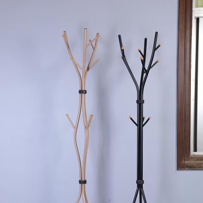 China Convertible Molded Man Rack Hang New Design Iron Metal Tree Standing Coat Rack For Entrance for sale