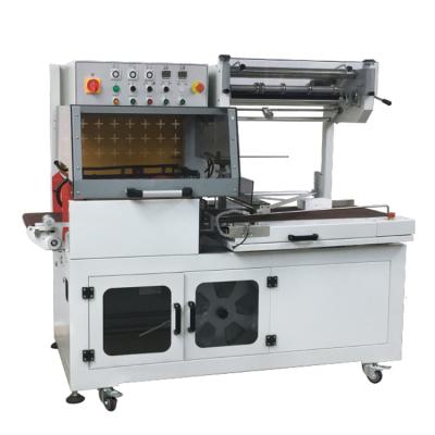 China High Reliability Plastic Film Carton Packaging Machine Mask Packer Heat Shrink Film Sealing And Slitting Machine for sale