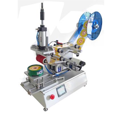 China Food Semi-automatic Labeling Machine Flat Toy Labeling Machine Small Lid Box Bag Labeling Machine for sale