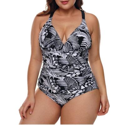 China Plus Size Tropical Palm Printed Deep V Neckline Special Design Back Ties One Pieces Plus Size Swimwear for sale