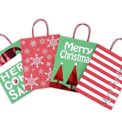 China New Design Recyclable In Stock Manufacturer Low Cost Recycle Kraft Paper Christmas Gift Bag For Shopping for sale