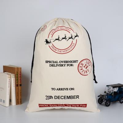 China Custom Reclycled Santa Sacks 2021 Simple Christmas Gifts Packaging Storing Cotton Santa Sacks Drawstring for sale