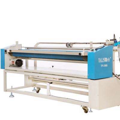 China New type nonwoven fabric rolling and cutting machine/automatic industrial fabric cutting machine best selling products in Europe 2400/2700x1100x1080mm for sale