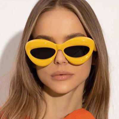 China Fashion sunglasses shape 2023 newest style sunglass candy color vintage tender thick lip shaped shades sunglasses for women for sale