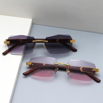 China Fashion Sunglasses 2023 Modern Customized Wooden Men 2022 PC Sun Glasses New Design Stylish Sun Glass Small Frame Luxury Rimless Shades for sale