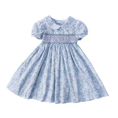 China Anti-Static Hot Selling Toddler Girls Clothing Hand Smocked Lace Children Short Smocked Dress With Flower for sale