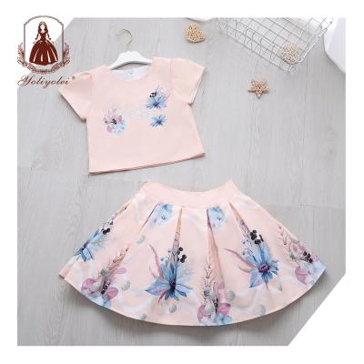 China Summer Kids Clothing Shorts Sleeve Pink Casual O-Neck 2 Piece Top + Lovely Skirt Polyester Girl Clothing Set With Flower Printed for sale