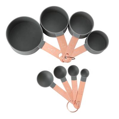 China Viable Hot Selling Plastic Nested 8pcs Measuring Cups And Spoons Set With Copper Handle Rose Gold Handle Cooking Tools for sale