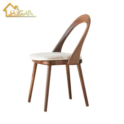 China Nordic Scandinavian Unique Design Wooden Back And Gray Fabric Chair Ring Modern Contemporary Dining Chairs for sale