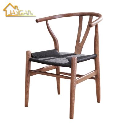 China Scandinavian Hot Sale Wooden Dinner Chairs Comfortable Furniture Restaurant Fork Y Walnut Dining Chairs for sale