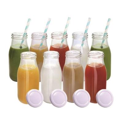 China 100ml 200ml 300ml Round Milk Glass Eco-friendly Bottle Drinking Juice Bottles With Plastic Lids for sale