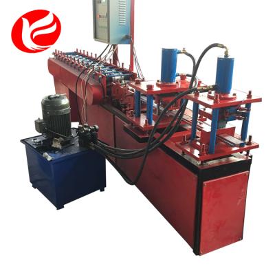 China Hotels Galvanized Color Steel Metal Door Machine Roller Shutter Slat Roll Forming Machinery for sale