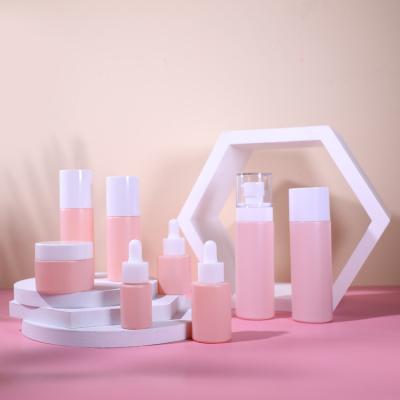 中国 30ml 20ml 15mlのピンクの化粧品のガラス ビンはガラス点滴器のびんを置いた 販売のため