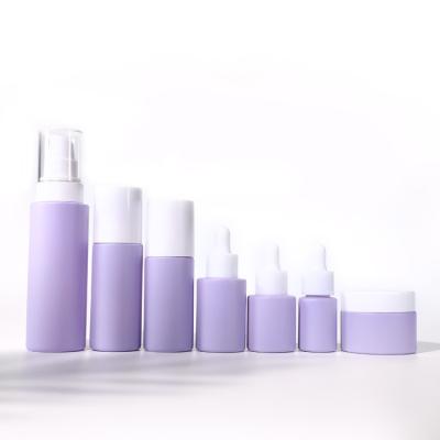 China Glass Cosmetics Pump Bottle Custom Packaging Round 40ml 50ml 100ml Skin Care for sale